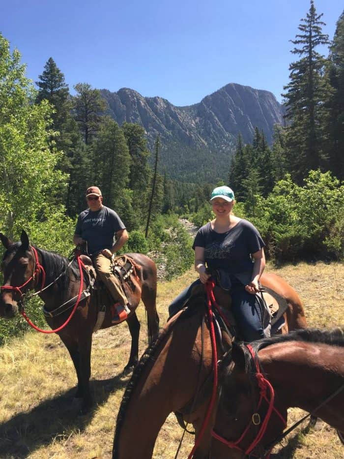 riding horses in the mountains